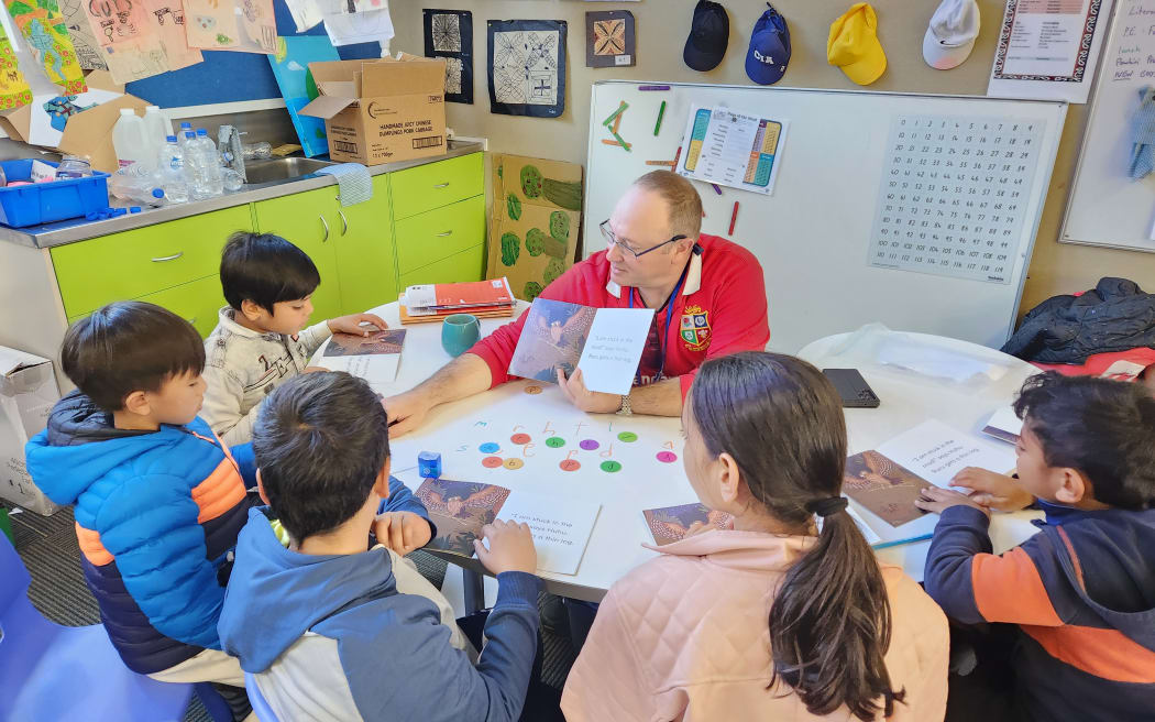 Petone Central School teacher Richard Taylor working with ESOL pupils.