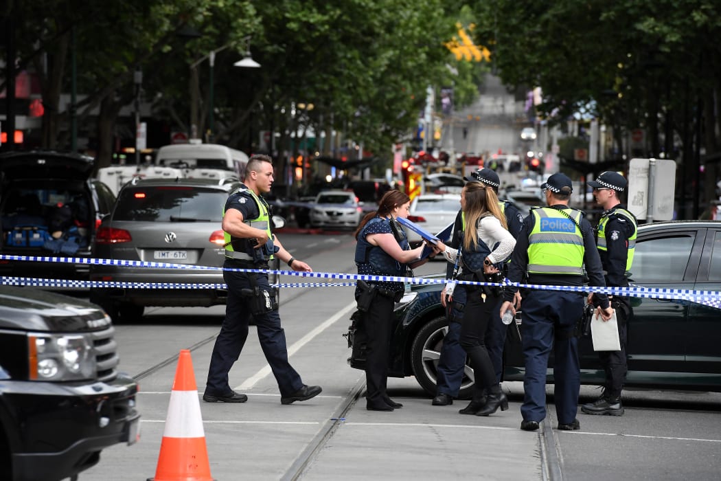 Police cordon off Bourke St following a stabbing incident in Melbourne.