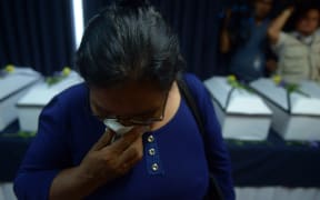 Relatives of 11 victims of the 1981 El Mozote massacre were given the exhumed remains of their loved ones at the Supreme Court of Justice in San Salvador in May this year.