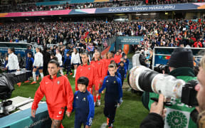 Players arrive on the field prior to the Australia and New Zealand 2023 Women's World Cup Group E football match between Portugal and the United States at Eden Park in Auckland on 1 August, 2023.