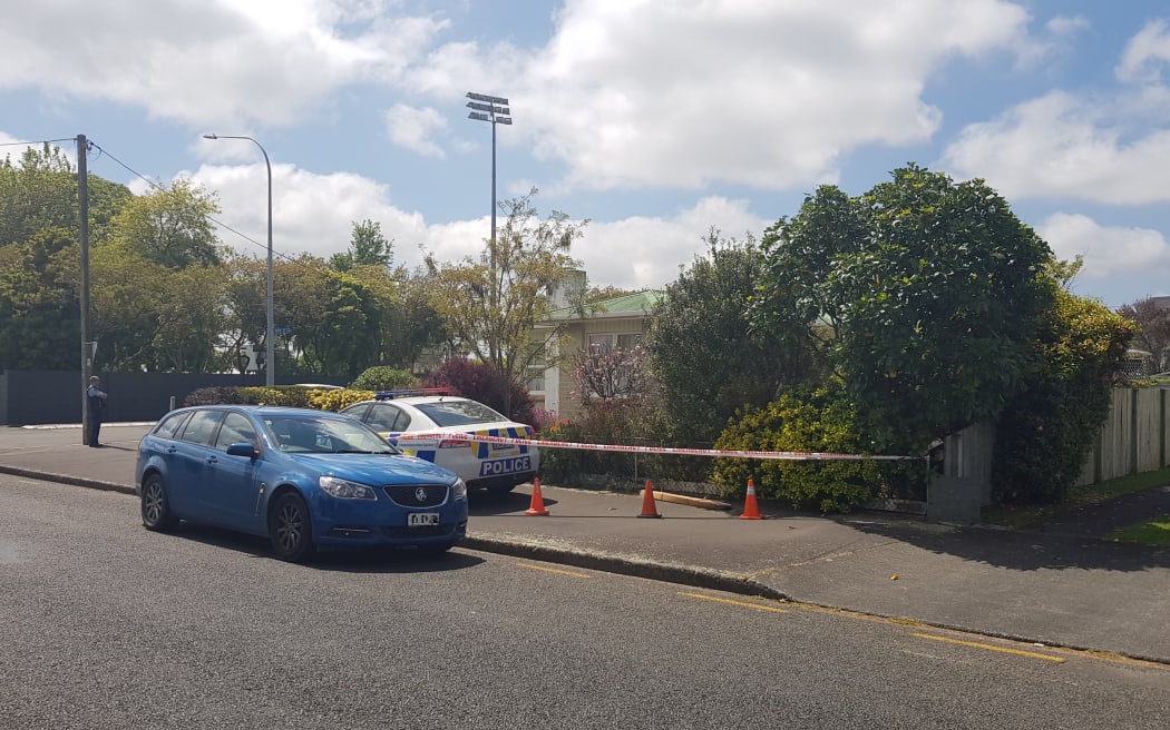 Police at the cordon around the Bath St, Levin, house on Monday morning,