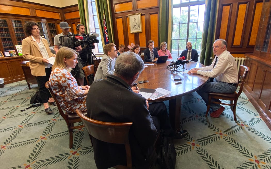 In April 2021, the then Speaker Trevor Mallard meets with journalists in his office to announce a new building at Parliament.