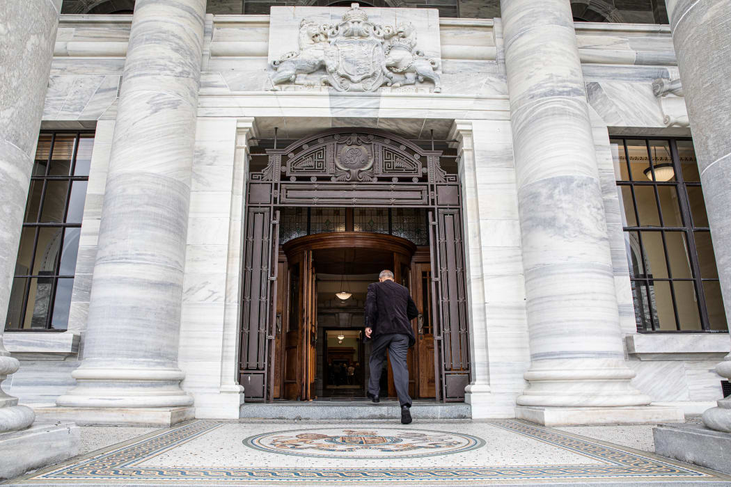 Entering Parliament House through the main doors, only used for ceremonial occasions