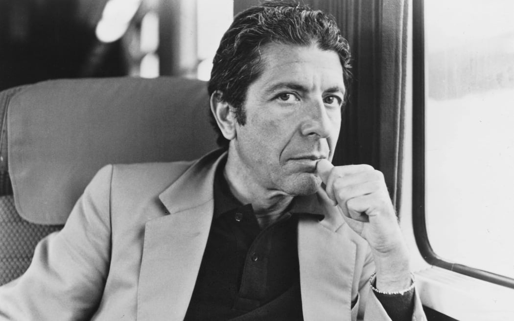 Leonard Cohen black and white on a train