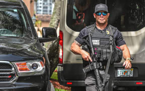 A member of the Secret Service is seen in front of the home of former President Donald Trump at Mar-A-Lago in Palm Beach, Florida on August 9, 2022.