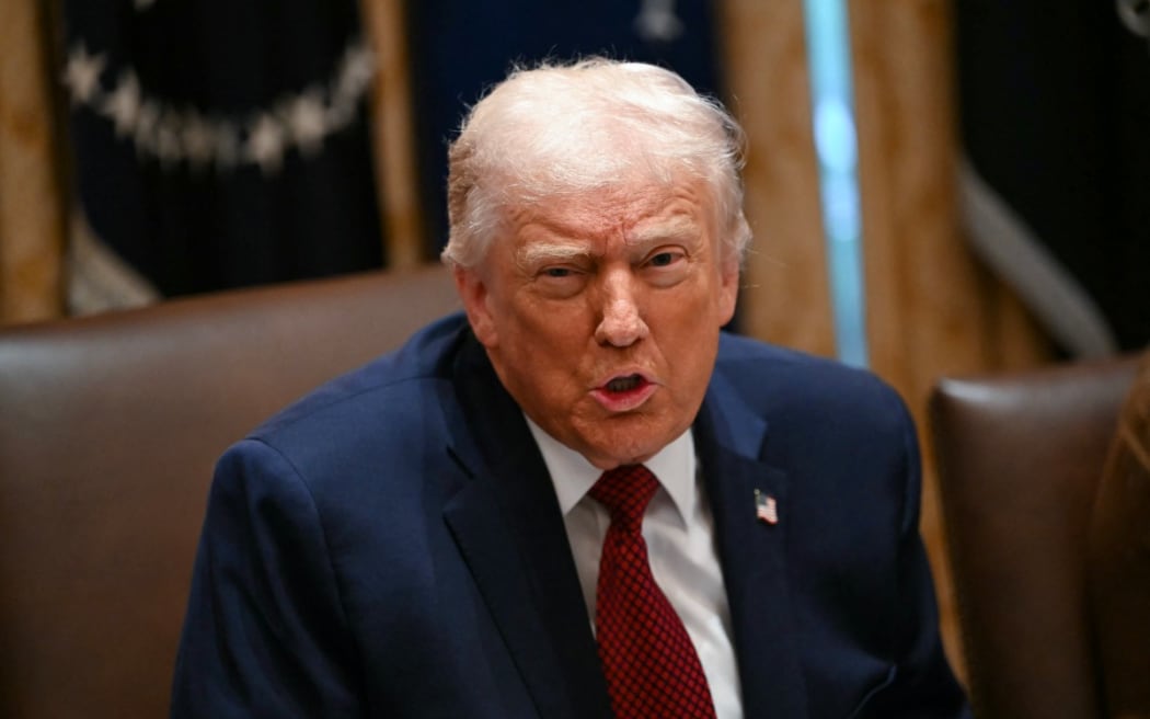 US President Donald Trump speaks during a roundtable event to discuss aid for farmers, in the Cabinet Room of the White House in Washington, DC, on December 8, 2025.