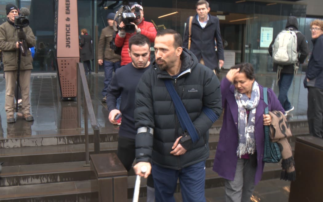 Mosque attack families exit court after the man charged pleaded not guilty to all charges.