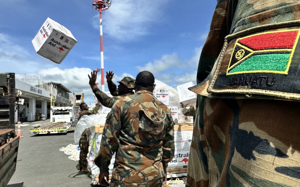 Aid supplies from Australia are unloaded at Port Vila's main airport, as earthquake response efforts continue in Vanuatu, on 21 December, 2024.