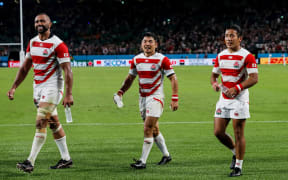 Captain Michael Leitch , Fumiaki Tanaka and Yutaka Nagare after their historic win against Ireland.