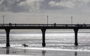 The public have been escorted out of a Christchurch beach after a shark sighting.