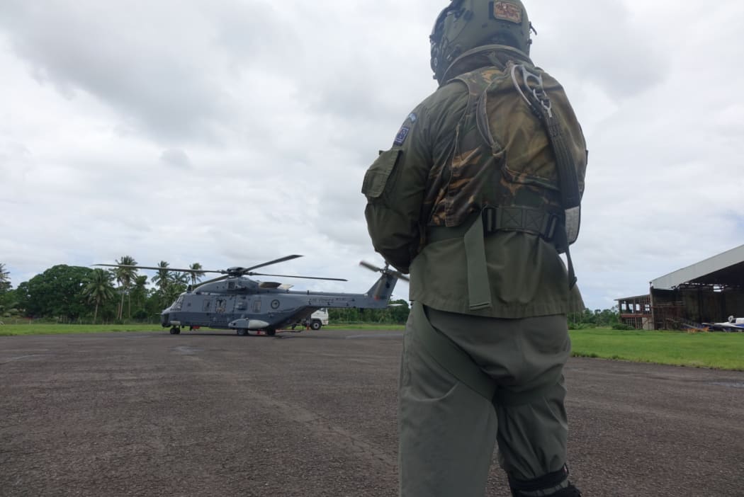The NZDF NH90 refuels before another aid drop to remote villages in Fiji
