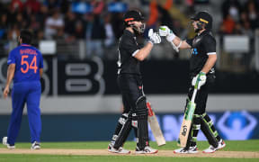 New Zealand's Kane Williamson and Tom Latham