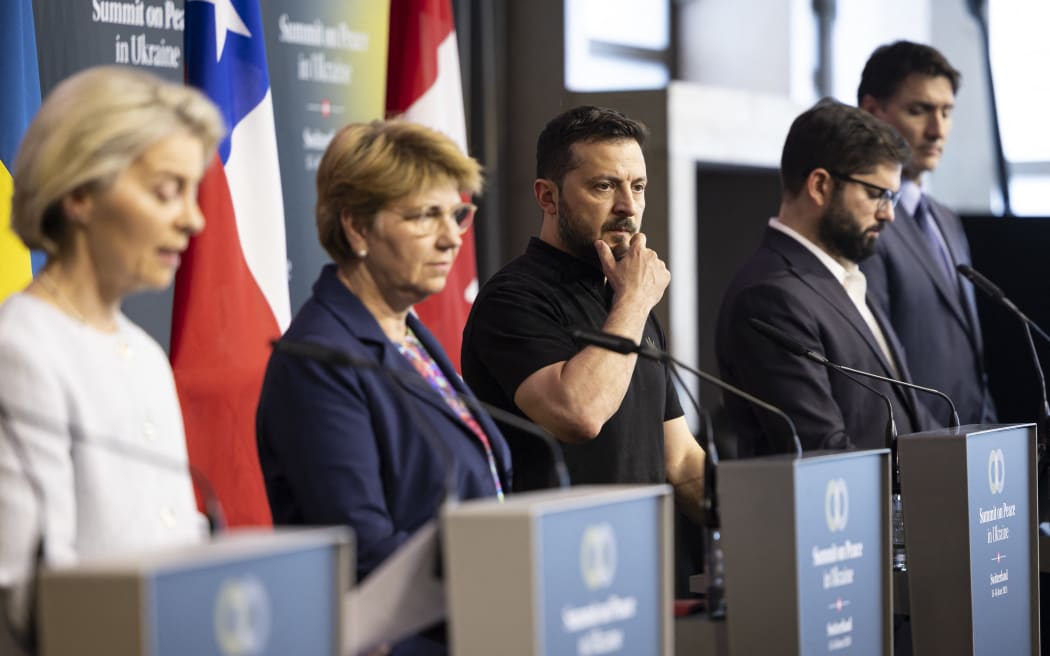 President of the European Commission Ursula von der Leyen (L), Swiss Federal President Viola Amherd, Ukraine's President Volodymyr Zelensky, Chile's President Gabriel Boric and Canadian Prime Minister Justin Trudeau address the closing press conference of the Summit on peace in Ukraine, at the luxury Burgenstock resort, near Lucerne, on June 16, 2024. Dozens of countries meeting for a landmark international summit on peace in Ukraine agreed Sunday that Kyiv should enter dialogue with Russia on ending the war, while strongly supporting Ukraine's independence and territorial integrity. (Photo by MICHAEL BUHOLZER / POOL / AFP)