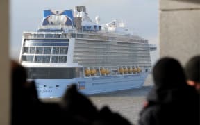 The new cruise ship of the Meyer dockyard in Papenburg, 'Ovation of the Seas', arriving in bremerhaven, Germany, 28 March 2016. After the first major test run on the North Sea, the 348 meter long ship will be finalised for the handover to the US-American shipping company 'Royal Carribean International'.