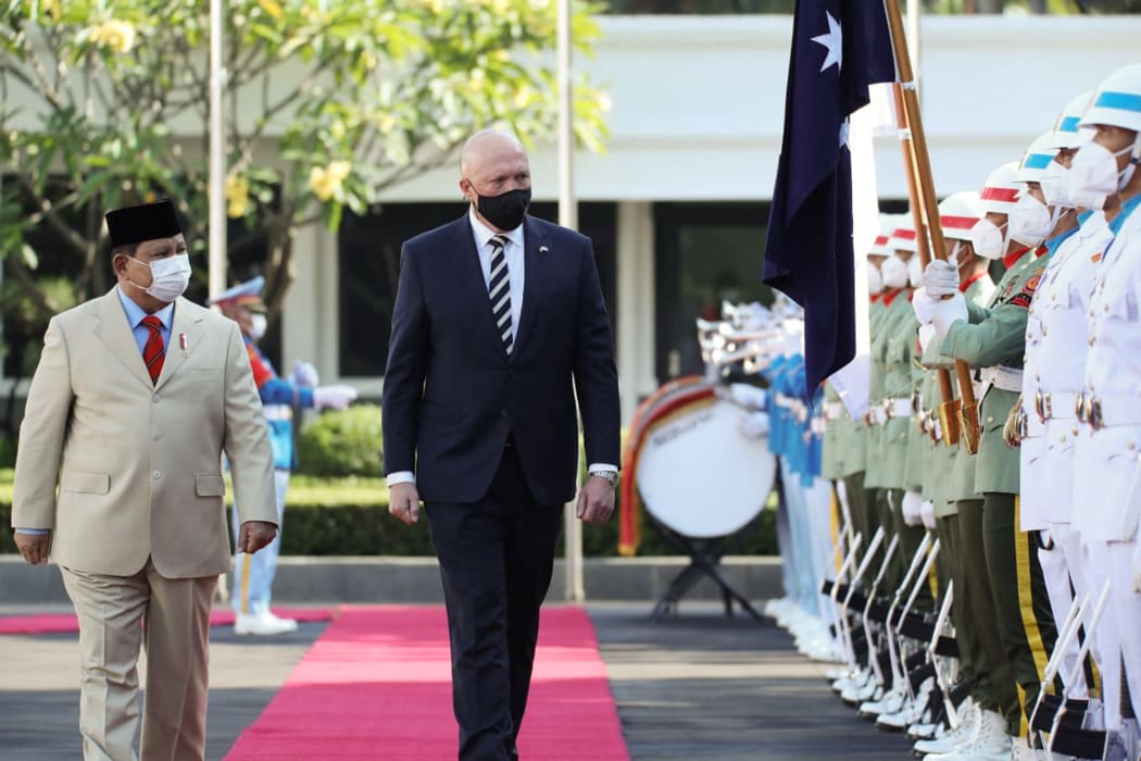 Indonesia's defence minister Prabowo Subianto (left) and Australia defence minister Peter Dutton  inspect an honour guard before their meeting.