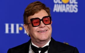 BEVERLY HILLS, CALIFORNIA - JANUARY 05: Elton John poses in the press room with the award for Best Original Song - Motion Picture during the 77th Annual Golden Globe Awards at The Beverly Hilton Hotel on January 05, 2020 in Beverly Hills, California.   Kevin Winter/Getty Images/AFP