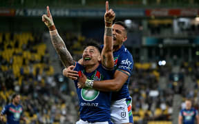 Charnze Nicoll-Klokstad celebrates after scoring against the Newcastle Knights at Sky Stadium in March 2023.
