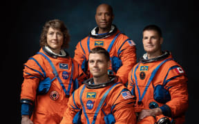 PHOTO DATE: March 29, 2023. LOCATION: Bldg. 8, Room 183 - Photo Studio. SUBJECT: Official crew portrait for Artemis II, from left: NASA Astronauts Christina Koch, Victor Glover, Reid Wiseman, Canadian Space Agency Astronaut Jeremy Hansen. PHOTOGRAPHER: Josh Valcarcel