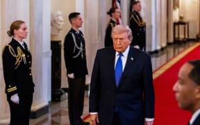 President Donald Trump arrives for a Medal of Honor ceremony in the East Room of the White House, on March 2 in Washington.
