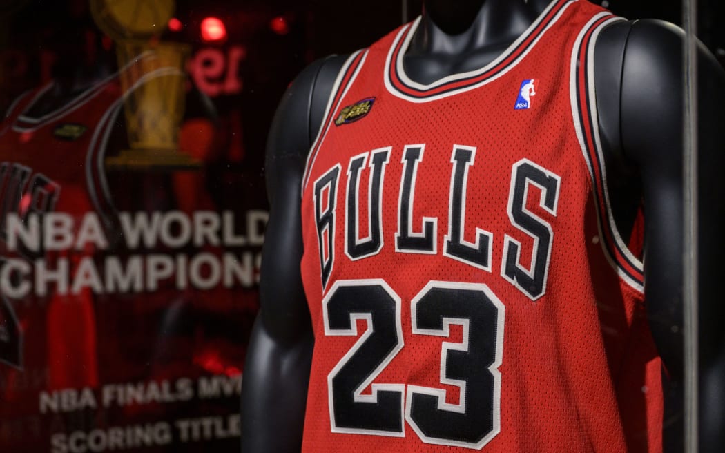 Michael Jordan’s game-worn 1998 NBA Finals ‘The Last Dance’ jersey, from game 1, is displayed during Sotheby’s ‘Invictus’ sales, in New York City on September 6, 2022. - The iconic red Chicago Bulls jersey, with Jordan's number 23 on the back, is only the second worn by the star during his six championships to be sold at auction. (Photo by ANGELA WEISS / AFP)