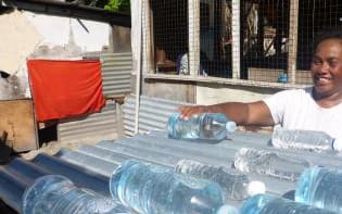 Kiribati is promoting a new solar water disinfection method involving heating  plastic water bottles on corrugated iron.
