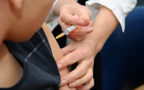 VACCINATION CENTER 
Reportage in the Health and Prevention Centre run by the local committee for social hygiene (CDHS) in Lyon, France. DTPP vaccination : Diphtheria - Tetanus - Poliomyelitis - Pertussis. Tetravac is a vaccination used conjointly against diphtheria, tetanus, poliomyelitis and pertussis (whooping cough). It is administered as a booster between the ages of 5 and 13. 

AUBERT / BSIP (Photo by AUBERT / BSIP / BSIP via AFP)