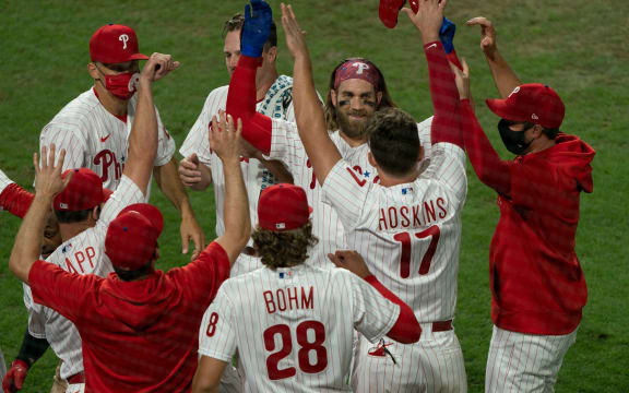 Philadelphia Phillies players celebrate.