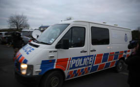 The police van, believed to be carrying Russell John Tully.
