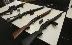 Some of the illegal and legal firearms on display at the demonstration by police