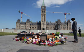 Canadian Prime Minister Justin Trudeau visits the makeshift memorial erected in honor of the 215 indigenous children remains found at a boarding school in British Columbia, on Parliament Hill June 1, 2021 in Ottawa.