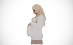 Pregnant woman in hijab