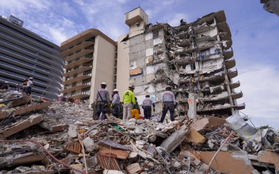 Search and rescue personnel work at the site of a collapsed Florida condominium complex in Surfside, Miami, US, on 3 July 2021.