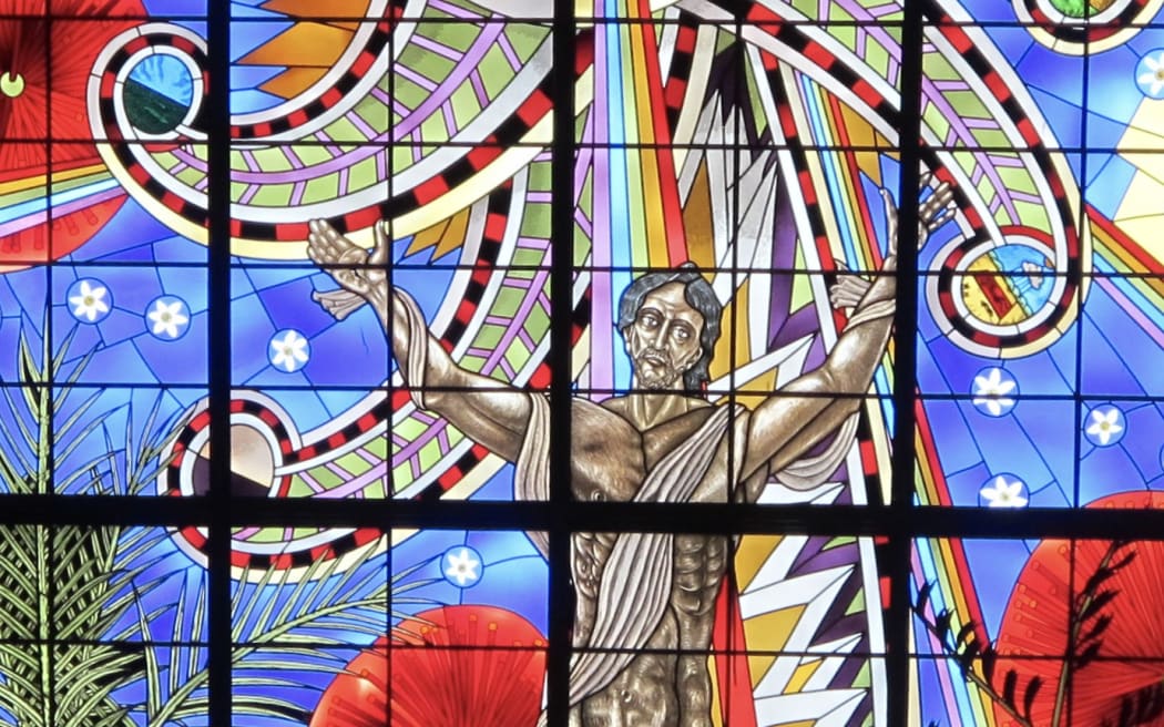 Stained glass image of the risen Christ designed by Nigel Brown