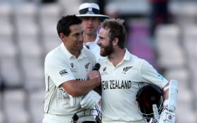 Ross Taylor and Kane Williamson celebrate their test championship win over India.
