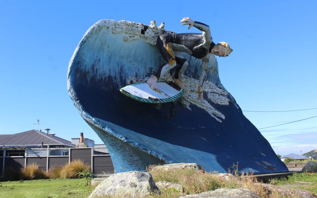 The surfer statue at Colac Bay/Ōraka was not fiberglassed when it was built in 1999, which ultimately compromised its longevity.