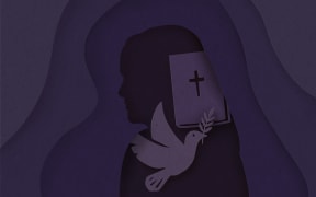 Cut paper silhouette of woman, bible and dove