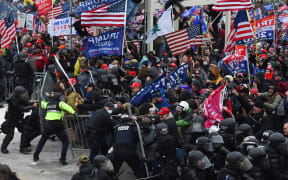 Trump supporters clash with police and security forces at the US Capitol on 6 January 2021.