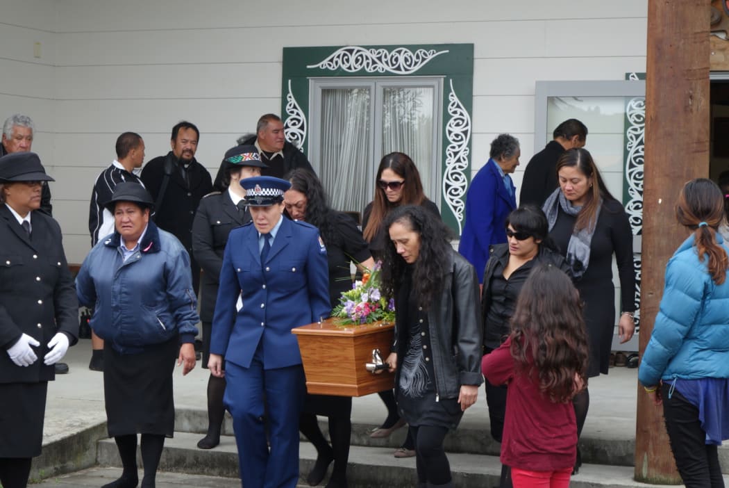 Mourners at the funeral carrying Lady Latimer's coffin