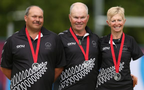 Mark Noble, Barry Wynks and Lynda Bennett win silver in the Lawn Bowls Open Triples Final. Glasgow 2014 Commonwealth Games.
