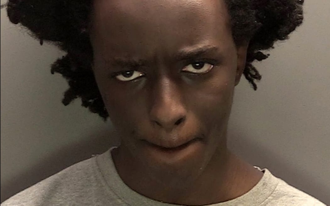 A handout image released by Merseyside Police and received in London on January 20, 2025, shows the custody photograph of Axel Rudakubana who has pleaded guilty to killing three young girls in a stabbing attack in 2024 last year that sparked the UK's most violent riots in a decade.