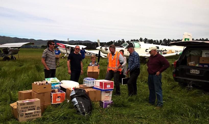 Members of the farming community come together to get supplies out to isolated farmers.