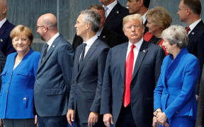 From left, German Chancellor Angela Merkel, Belgium's Prime Minister Charles Michel, NATO Secretary General Jens Stoltenberg, US President Donald Trump and Britain's Prime Minister Theresa May attend the opening ceremony of the Nato summit in Brussels.