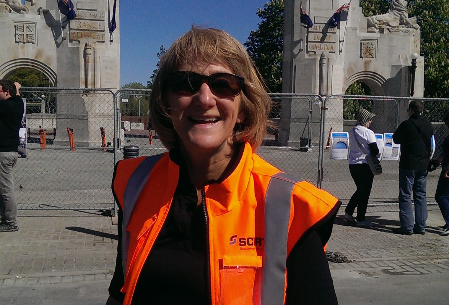 Ros Service next to Christchurch's iconic Triumphal Arch, which cost almost $7 million to fix after the earthquakes.