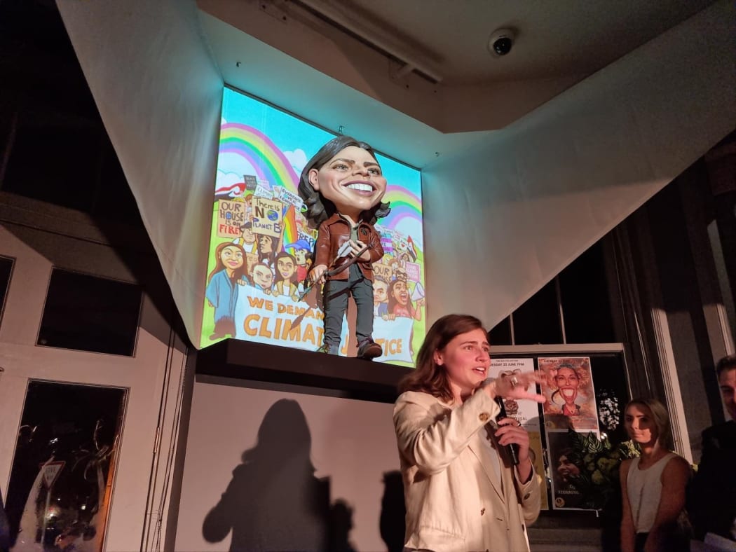 Chloe Swarbrick with her puppet caricature at Wellington's Backbencher pub.