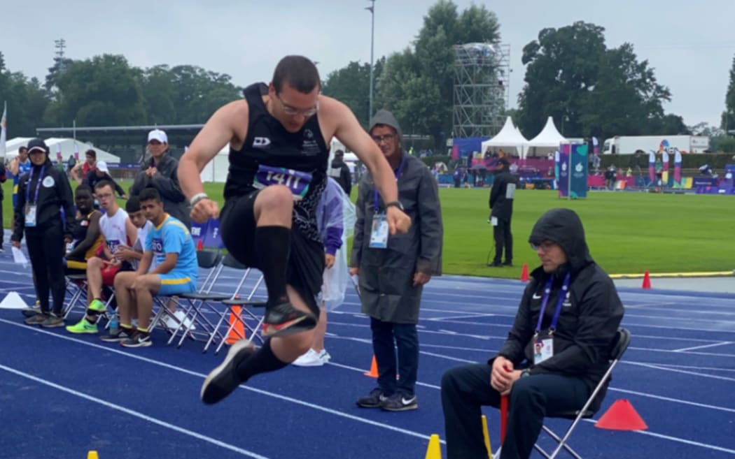 Matthew Di Leva (Wellington) jumps to silver in the pouring Berlin rain at the Olympiastadion.