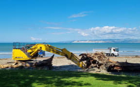 Slash clean-up is underway this morning at Waikanae, Gisborne's main beach, following Cyclone Gabrielle.