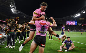 Paul Alamoti of the Panthers celebrates with teammates after scoring a try during the NRL Grand Final match between the Melbourne Storm and the Penrith Panthers at Accor Stadium in Sydney.