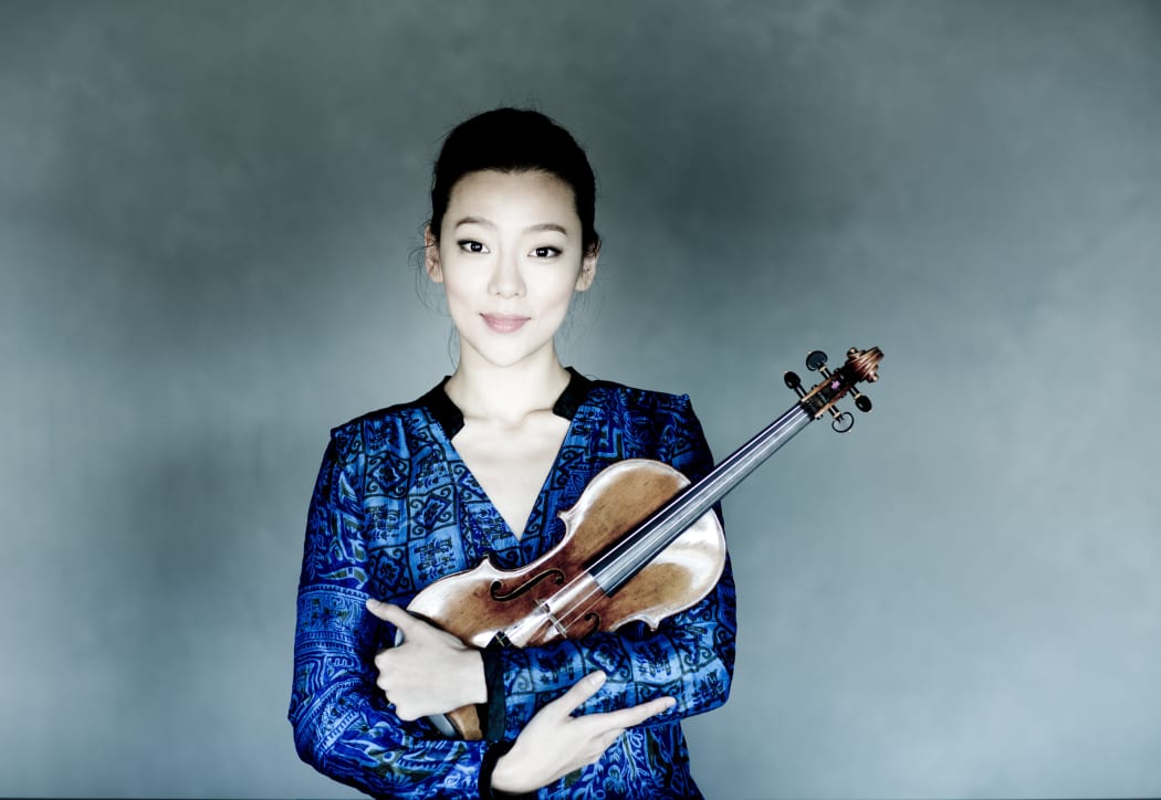 Photo of violinist Clara-Jumi Kang.