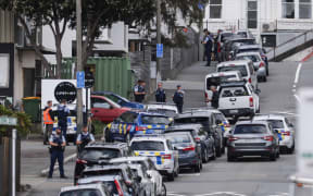 Armed police at the edge of a cordon on Hopper Street, Wellington.