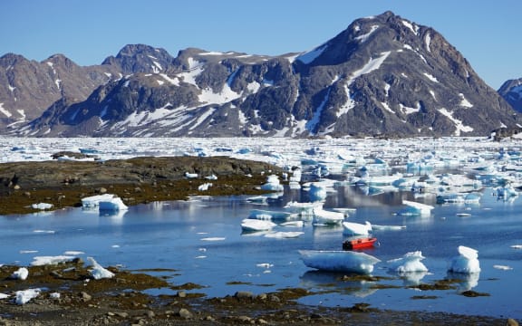 The Greenland icecap, which is up to 3 kilometres thick, is already melting and losing mass.